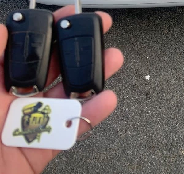 Two Vauxhall flip keys with the PLK keyring